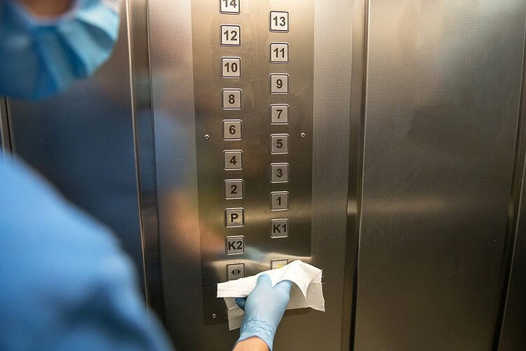disinfecting-elevator-buttons