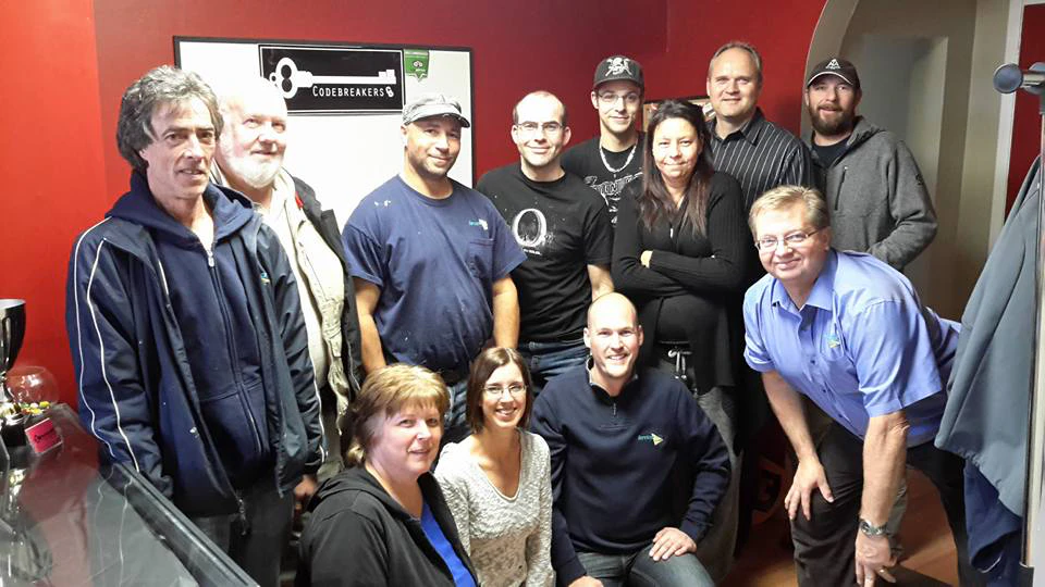 ServiceMaster-group-photo-in-an-escape-room-lobby